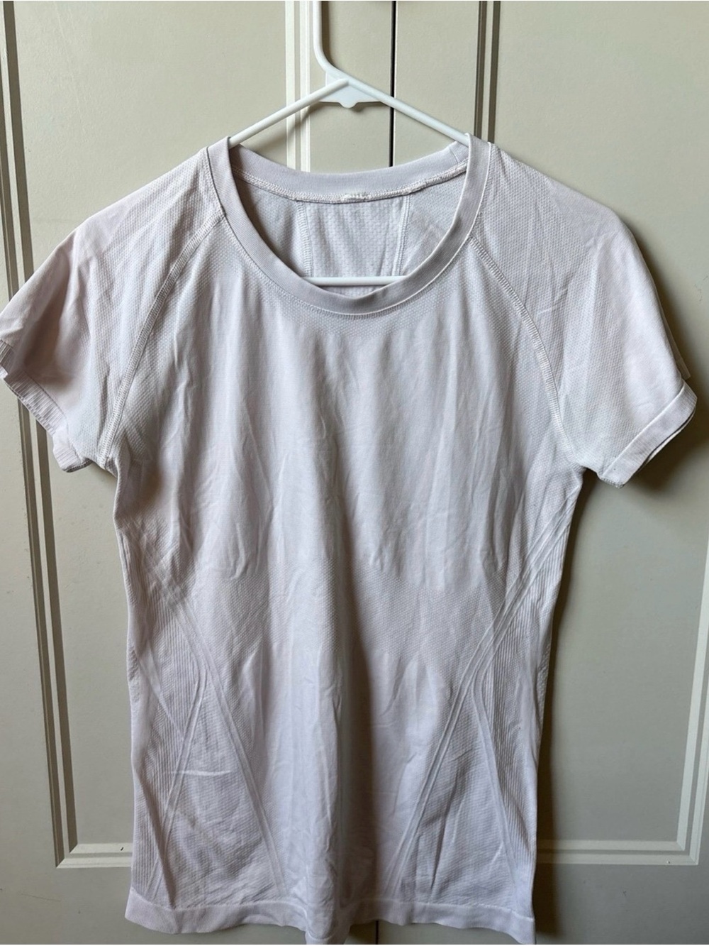 Women’s light pink Short Sleeve Performance Top